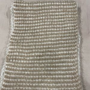 Simply Noelle infinity knit scarf. Acrylic and nylon based. Tan and white